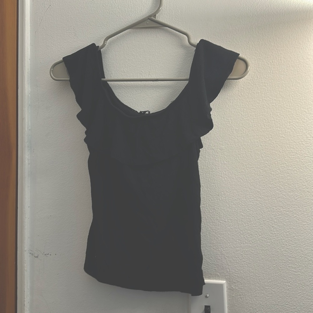 Black off-the-shoulder shirt perfect for day or night